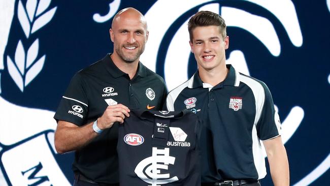 Carlton's pick number 19 Liam Stocker with Chris Judd. Picture: Michael Willson/AFL Media/Getty Images