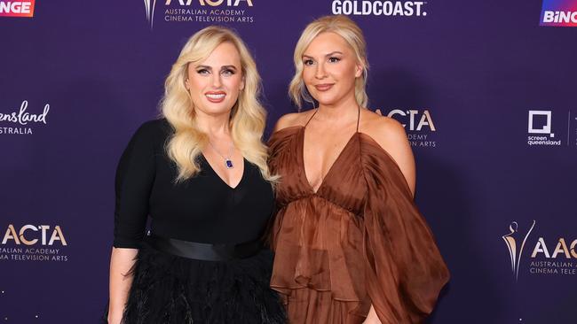 Rebel Wilson and partner Ramona Agruma walk the red carpet. Picture: David Clark