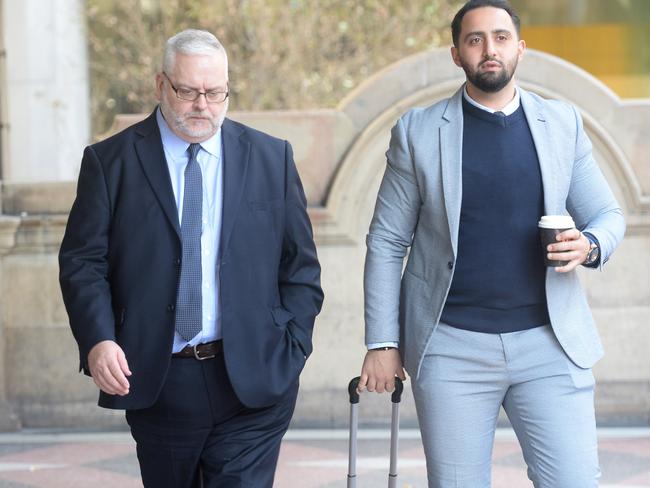 Stuart Robert Van Dyken (Left) and his instructing solicitor Mohamad Sakr at Downing Centre Court. Picture: Jeremy Piper