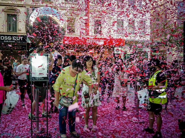 Confetti cannons mark the opening of the Boxing Day sales in Rundle Mall. Picture: Mike Burton