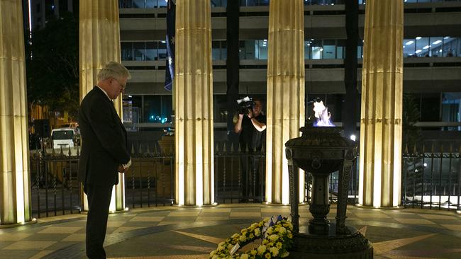 Governor of Queensland, Paul de Jersey AC takes a moment at the Anzac Day Wreath Laying Ceremony at The Shrine of Remembrance in Brisbane, Saturday, April 25, 2019. Anzac Day is a national day of remembrance to commemorate the service and sacrifice of Australian and New Zealand service men and women. Due to COVID-19 restrictions marches and commemorative services have been banned for the first time in more than a century. (AAP Image/Jono Searle) NO ARCHIVING