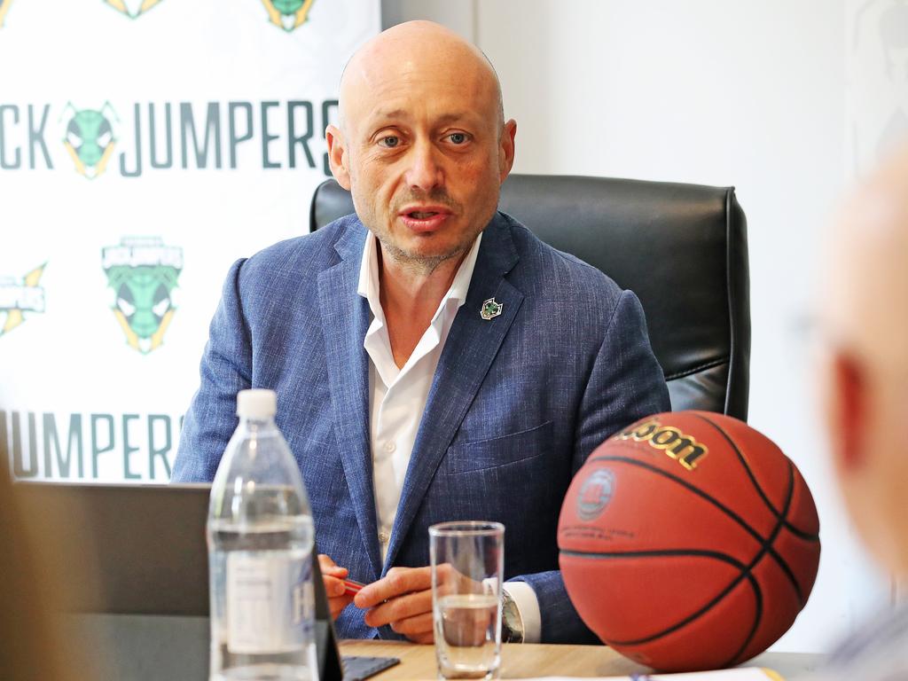 Owner of the NBL Larry Kestelman talks with board members of the Tasmania JackJumpers during their first meeting at their headquarters on Macquarie Street. Picture: Zak Simmonds