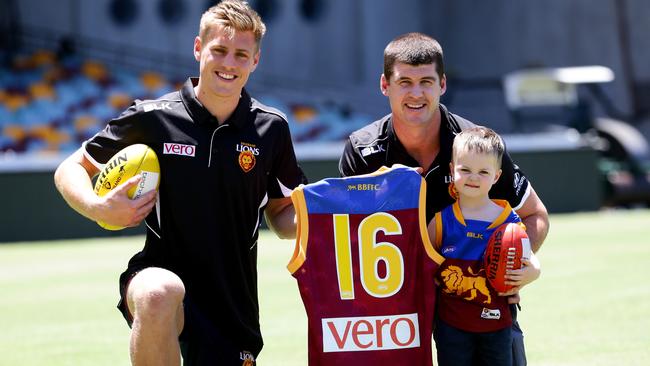 Jarrad Jansen (left) made a promising start to his career as a Lion wearing Jonathan Brown’s old jumper. Picture: Darren England