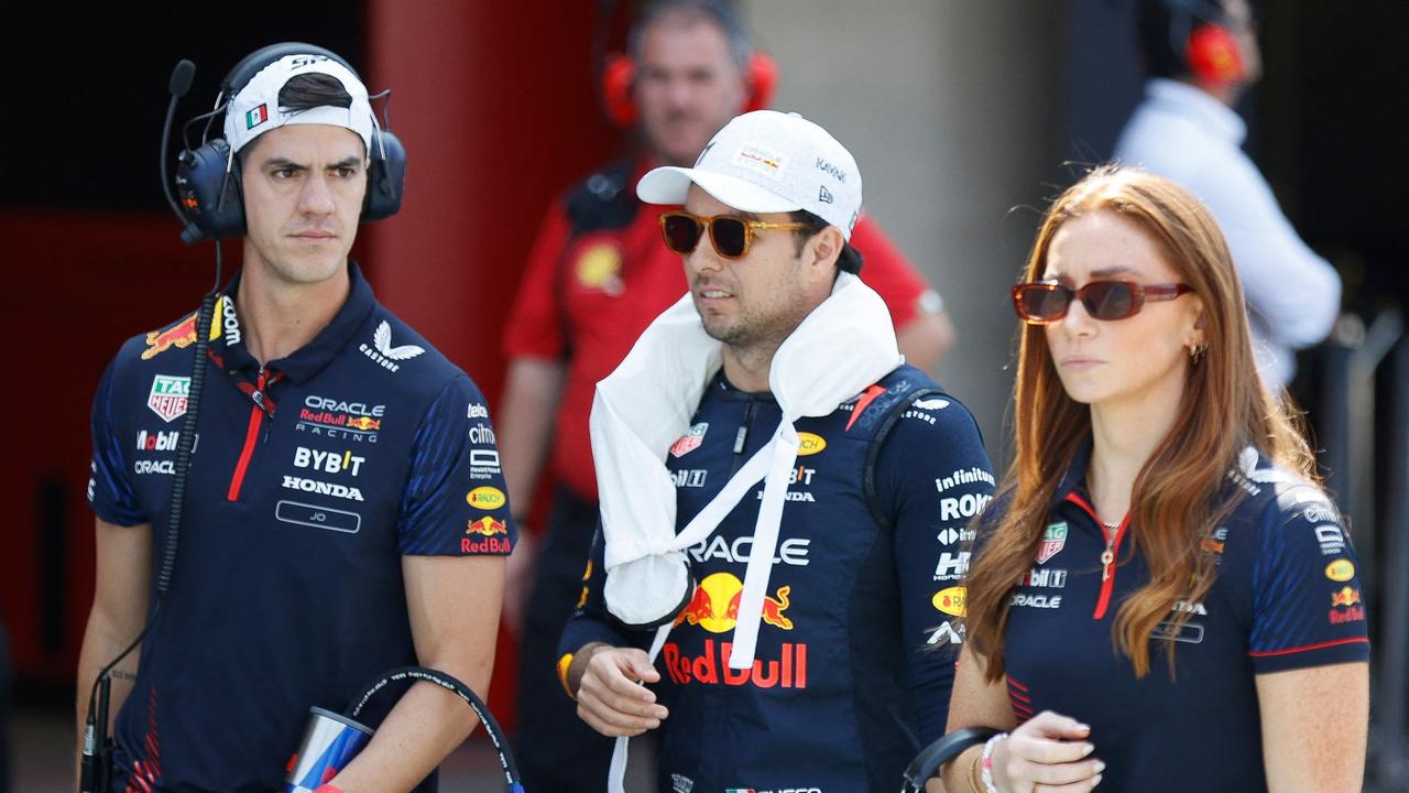 The pressure continues to grow on Sergio Perez (centre). (Photo by ANDRES STAPFF / AFP)