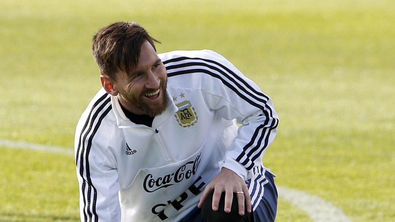 Lionel Messi of Argentina laughs