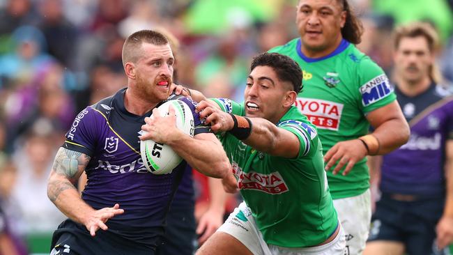 Cameron Munster is being chased by the Dolphins (Photo by Mark Nolan/Getty Images)