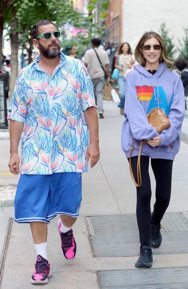 Known for his distinct sense of style (or lack thereof), Adam Sandler busts out a loud shirt with his blue basketball pants. Picture: Splash/Backgrid