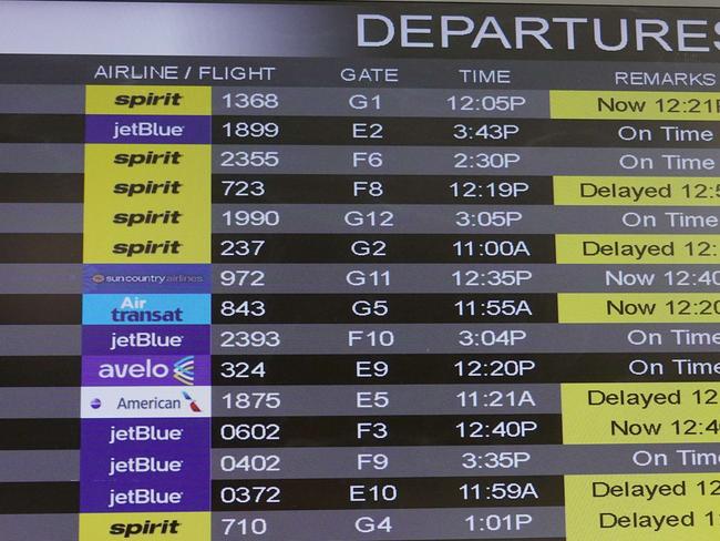 FORT LAUDERDALE, FLORIDA - FEBRUARY 07: The departure sign displays Spirit Airlines flights at the Fort Lauderdale-Hollywood International Airport on February 07, 2022 in Fort Lauderdale, Florida. Spirit and Frontier Airlines announced a planned $6.6 billion merger to create America's fifth-largest airline.   Joe Raedle/Getty Images/AFP == FOR NEWSPAPERS, INTERNET, TELCOS & TELEVISION USE ONLY ==