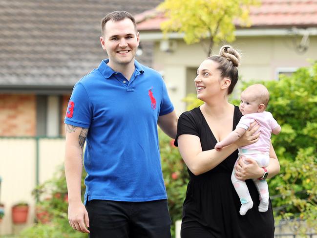 WEEKEND TELEGRAPHS SPECIAL. MUST TALK WITH PIC ED JEFF DARMANIN BEFORE PUBLISHING - Pictured is Eddie Dilleen with his wife Francesca and their 2 month old baby Aurora. Eddie grew up in Mt Druitt and is on the hunt for properties there. Picture: Tim Hunter.