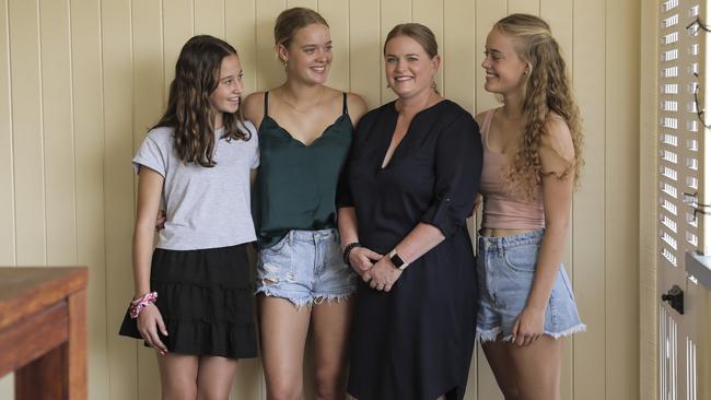 Jody Winstanley with her teenage daughters, and Erin, 14 and twins Chloe and Emma, 16. Picture: Mark Cranitch.