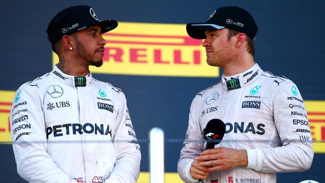 Mercedes have moved to hose down speculation of a feud between drivers Lewis Hamilton (L) and Nico Rosberg.