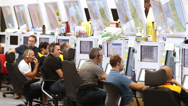 26/3/2019: Air traffic controllers in the main control room, under the control tower  Airservices Australia, at  Brisbane Airport . Lyndon Mechielsen/The Australian