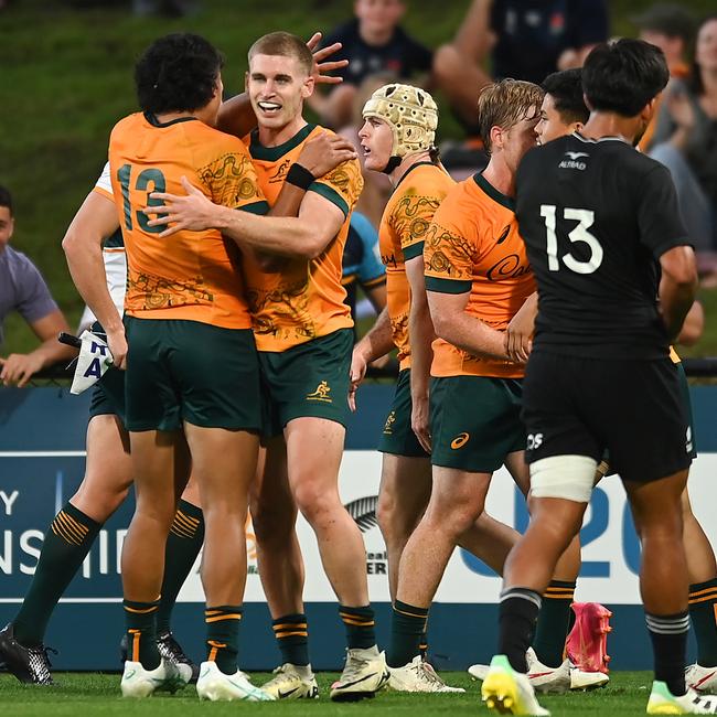 Will McCulloch of Australia celebrates with teammates after scoring a try during the Under-20 Rugby Championship. Photo by Albert Perez/Getty Images