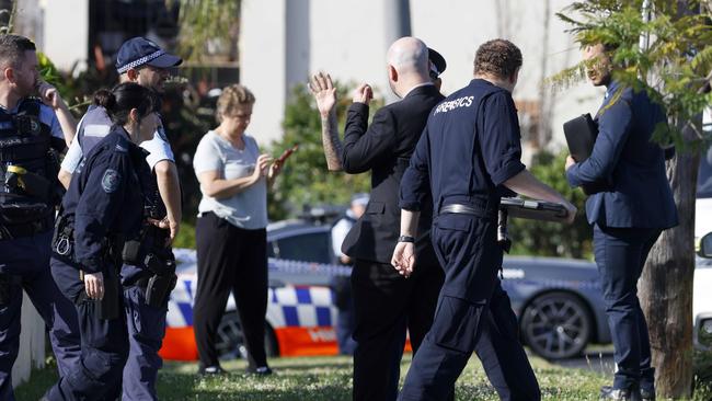 Police at a crime scene at a house on Layton St in Wentworthville, where at 64-year-old man was allegedly stabbed to death. Picture: Damian Shaw