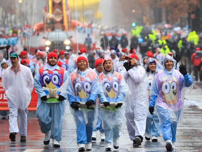 The Bluey balloon team march during the Annual Thanksgiving Day Parade in New York City. Picture: AFP