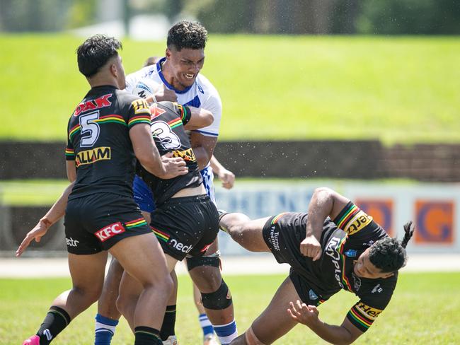 Semisi Faasisila falls after a head clash with Fanafou Seve. Picture: Julian Andrews