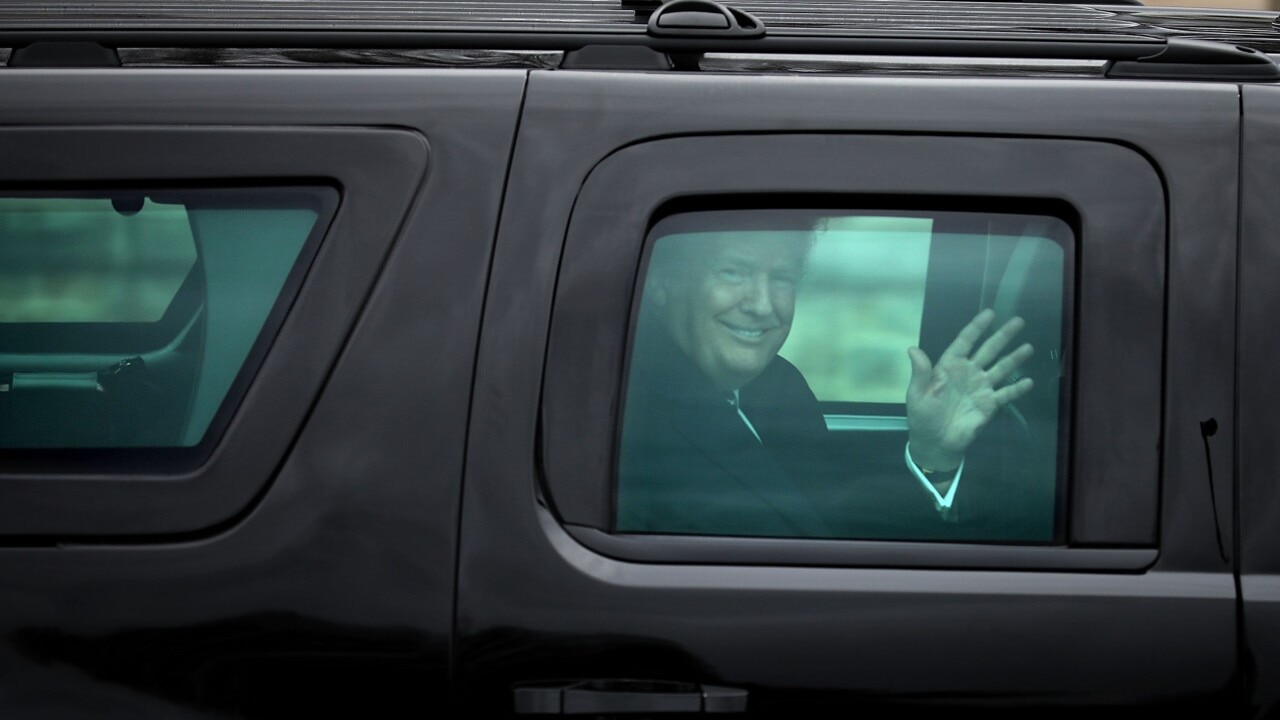 Trump pays suprise visit to supporters outside Walter Reed Army hospital