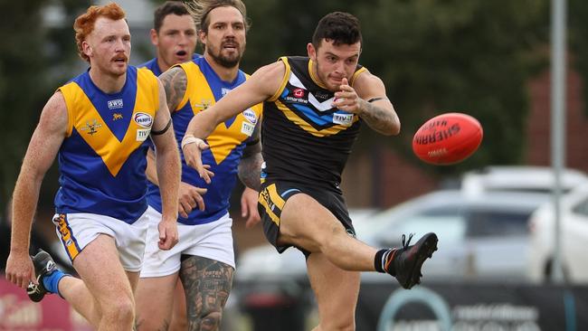 Max Tessari sends Caroline Springs forward. Picture: Local Legends Photography