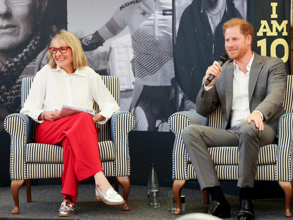 TV presenter Louise Minchin and Prince Harry onstage. Picture: Getty Images