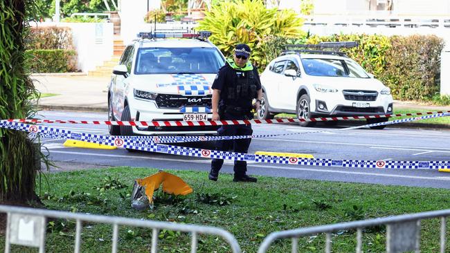 A police officer surveys the scene of the fatal crash on the morning of August 12. Picture: Brendan Radke