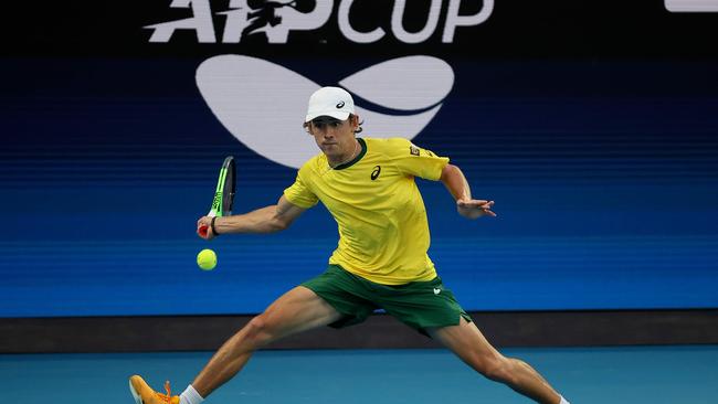 Australia's Alex de Minaur hits a return against Spain's Roberto Bautista Agut. Picture: AFP