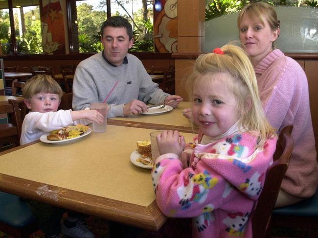 A family enjoys a meal at the old Warriewood Pizza Hut in 2002. Picture: Noel Kessel