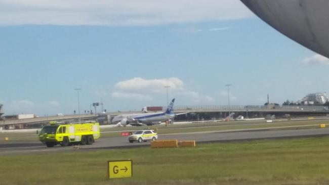 An emergency vehicle arrives just as the aircraft touched down. Picture: Kerrie Buhagiar