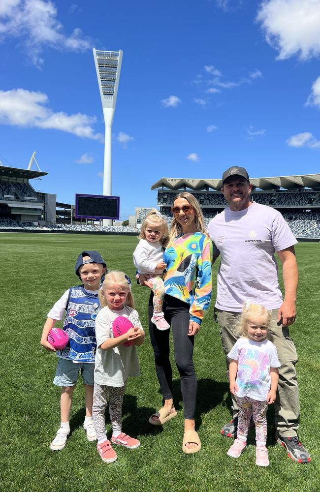 Henry McMinn with his parents and sisters. Picture: Supplied