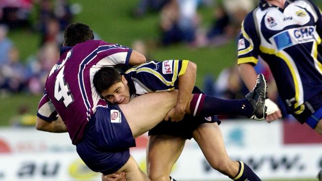 Ashley Alberts tackles Albert Torrens. Picture: Stewart Mclean