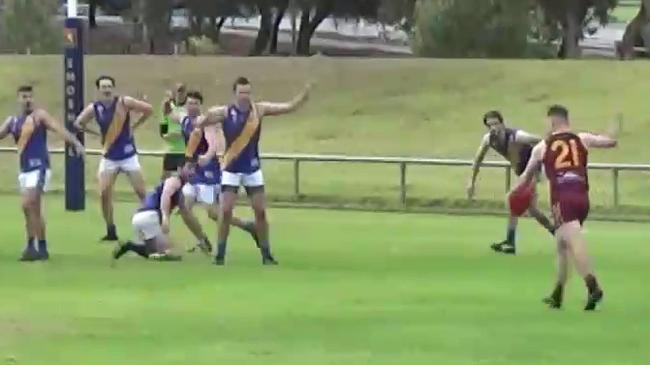 SMOSH West Lakes player Cohen Mattner has a shot after the siren to win the match in the Lions' division four Adelaide Footy League match against Mitcham on Saturday, May 11, 2019.