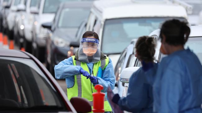 The drive through Covid-19 testing clinic at McDonald Jones Stadium, with between 200 to 250 cars passing through each hour. Picture: David Swift.