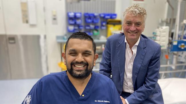 Dr Dinesh Palipana with Prof Michael Schuetz, who was the surgeon who operated on Dinesh on the night of his car accident in 2010. Palipana and Schuetz now collaborate on spinal research.