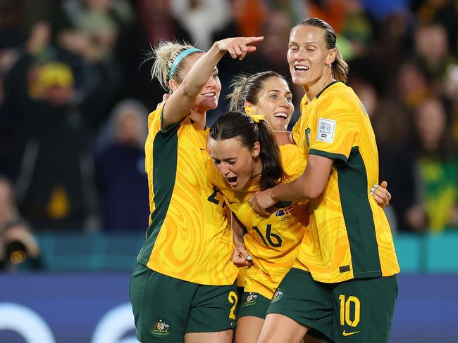 SYDNEY, AUSTRALIA - AUGUST 07: Hayley Raso (C) of Australia celebrates with teammates after scoring her team's second goal during the FIFA Women's World Cup Australia & New Zealand 2023 Round of 16 match between Australia and Denmark at Stadium Australia on August 07, 2023 in Sydney, Australia. (Photo by Cameron Spencer/Getty Images) *** BESTPIX ***