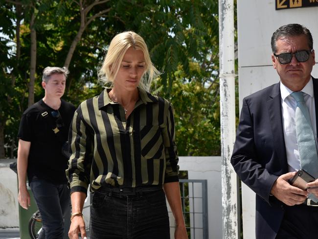 ‘I am devastated’. Viktoria Karida, widow of slain Sydney gangster John Macris, arrives in court in Greece. Picture: Spyros Bakalis