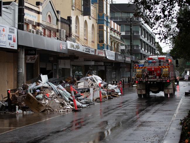 Clean up in Lismore CBD, March 29, after the second major flooding event in weeks. Picture: NCA NewsWire / Danielle Smith