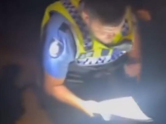 The TikTok video shows the officer reading the terms of the order. Picture: Tiktok