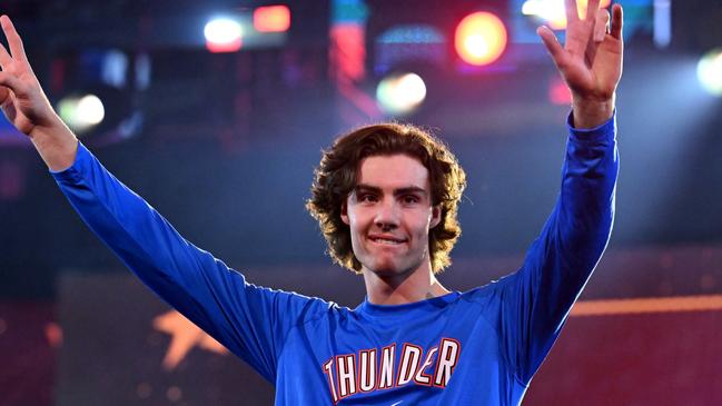 CLEVELAND, OHIO - FEBRUARY 18: Josh Giddey #3 of the Oklahoma City Thunder waves to the crowd during the 2022 Clorox Rising Stars at Rocket Mortgage Fieldhouse on February 18, 2022 in Cleveland, Ohio. NOTE TO USER: User expressly acknowledges and agrees that, by downloading and/or using this Photograph, user is consenting to the terms and conditions of the Getty Images License Agreement.  (Photo by Jason Miller/Getty Images)