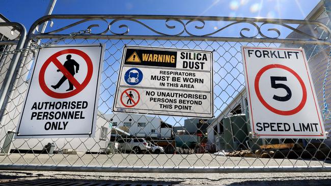 All stone benchtop fabrication businesses must have signage on their gates warning of the dangers of silica dust. Photo: Scott Powick