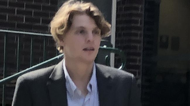 Christopher Busetti, 23, of Dee Why, leaving Manly Courthouse after being sentenced for throwing a schooner glass from the open-air, level three, roof top bar at The Steyne hotel, on to The Corso in Manly. Picture: Jim O'Rourke