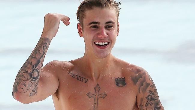 Justin Bieber spotted swimming at Bondi Iceberg in Sydney.