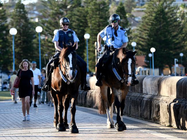 Mounted police patrolling a closed Coogee Beach on Friday, April 24. Picture: AAP