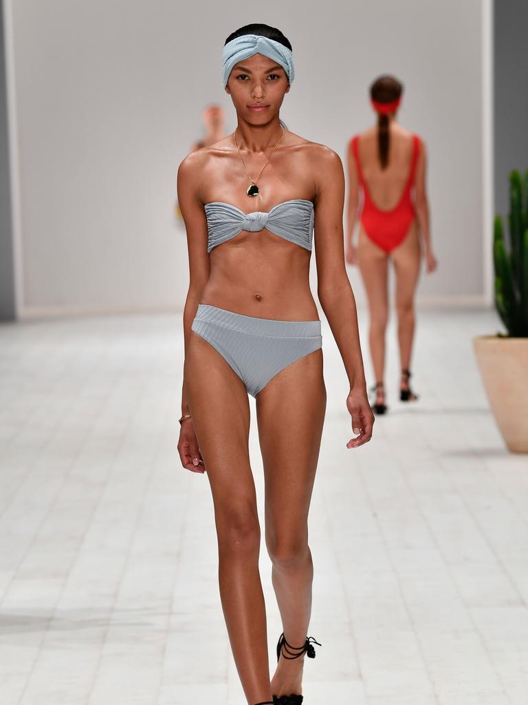 A model walks the runway in a design by Fella during the Swim show at Mercedes-Benz Fashion Week Resort 19 Collections at Carriageworks on May 14, 2018 in Sydney, Australia. (Photo by Stefan Gosatti/Getty Images)