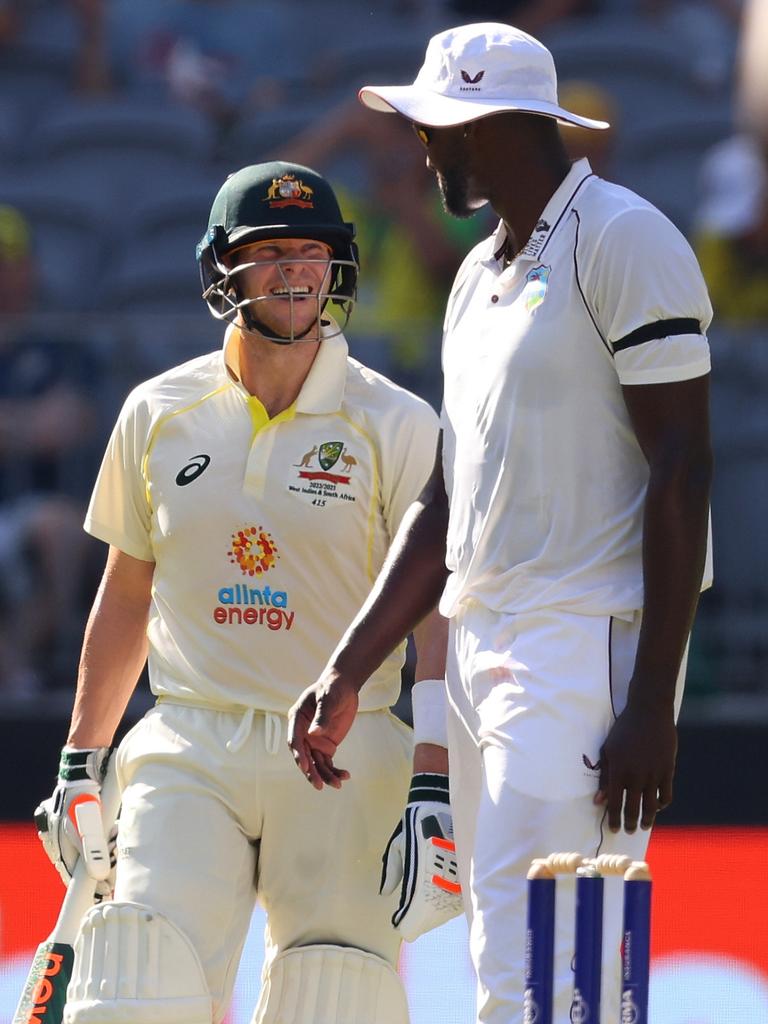 Steve Smith shares a laugh with Jason Holder. Picture: James Worsfold/Getty