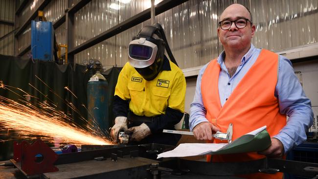 Rowlands Metalworks managing director Cameron Johnston in his factory’s welding area in Adelaide. Defence work has ‘stimulated our esprit de corps. For our guys, it is exciting.’ Picture: AAP