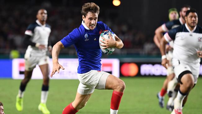 France halfback Baptiste Serin breaks away for a try against USA. Picture: AFP