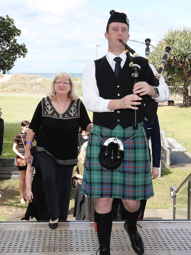 Family were ushered in to the service to the overtones of bagpipes. Picture: Glenn Hampson