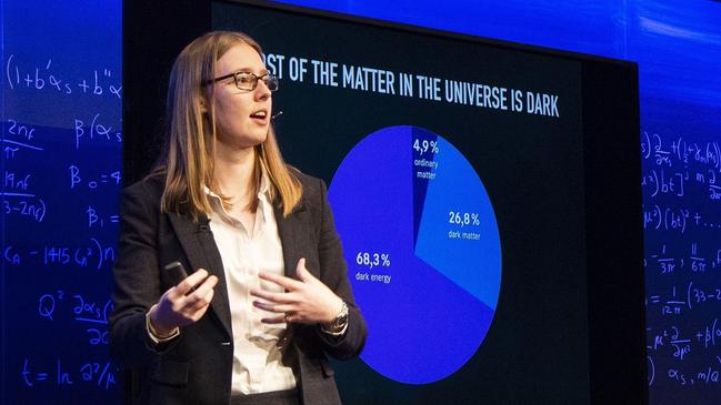 Phiala Shanahan during a lecture of her work and findings; she regularly travels overseas to speak at conferences.