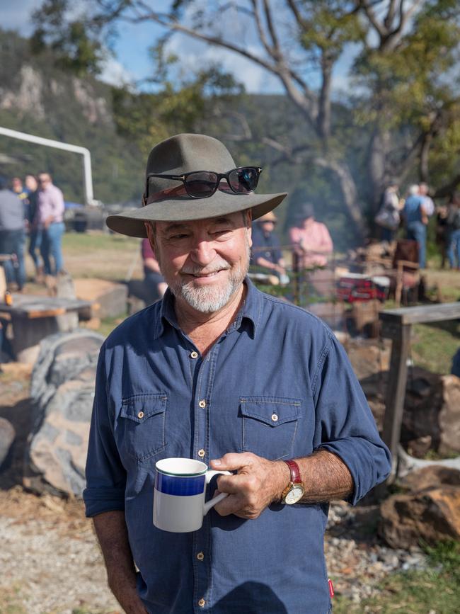 Singer/songwriter Williamson nurses a cuppa by the campfire. Picture: Luke Marsden