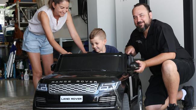 Kylie and Luke Spicer, with son Elijah, installed solar and use batteries to power their home. Picture: Richard Dobson