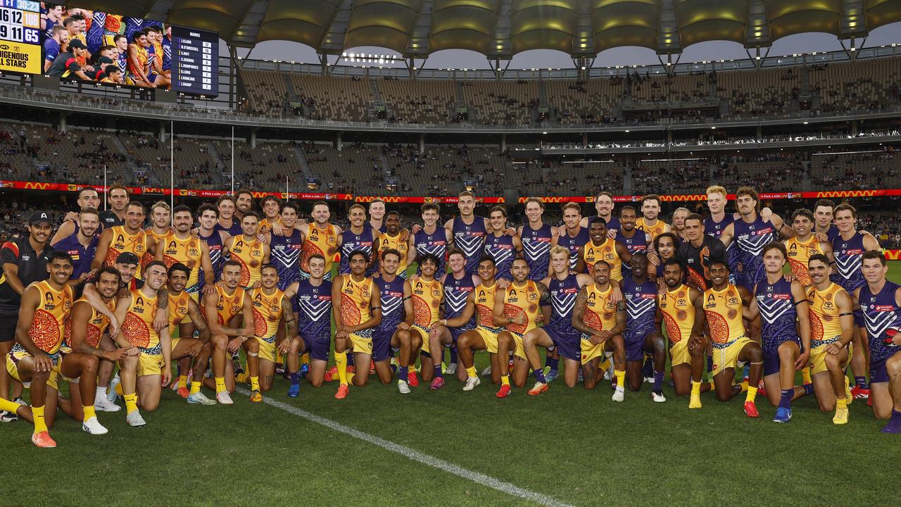 The All Stars and Dockers come together after the match. Picture: Michael Klein